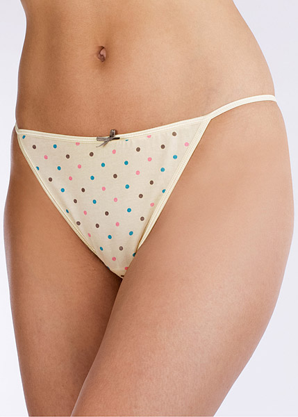 Les strings (lot de 6) 3x turquoise uni et 3x ivoire à pois. 95% coton, 5% élasthanne.