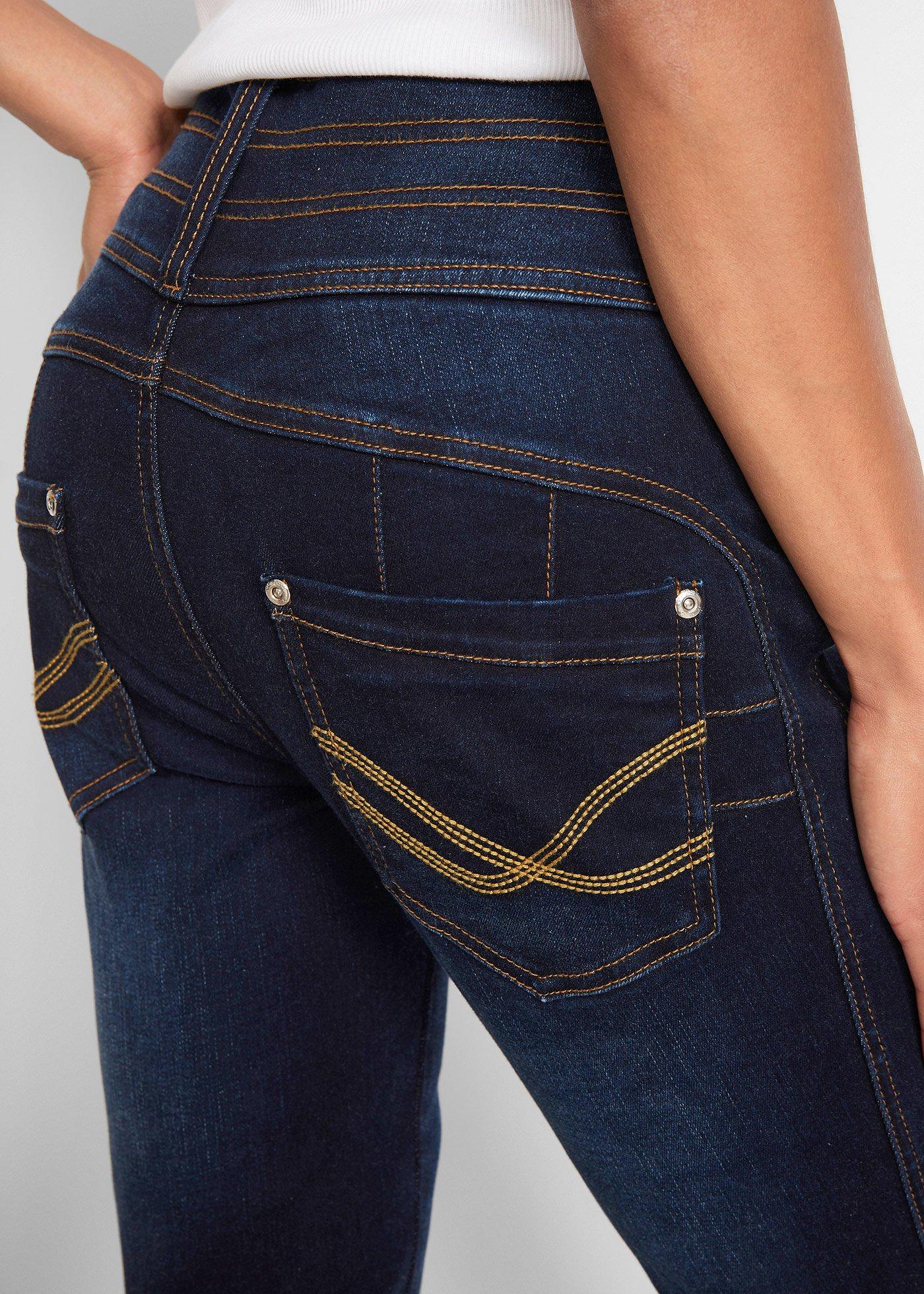 Modelujące dżinsy, krój bootcut - Bonprix