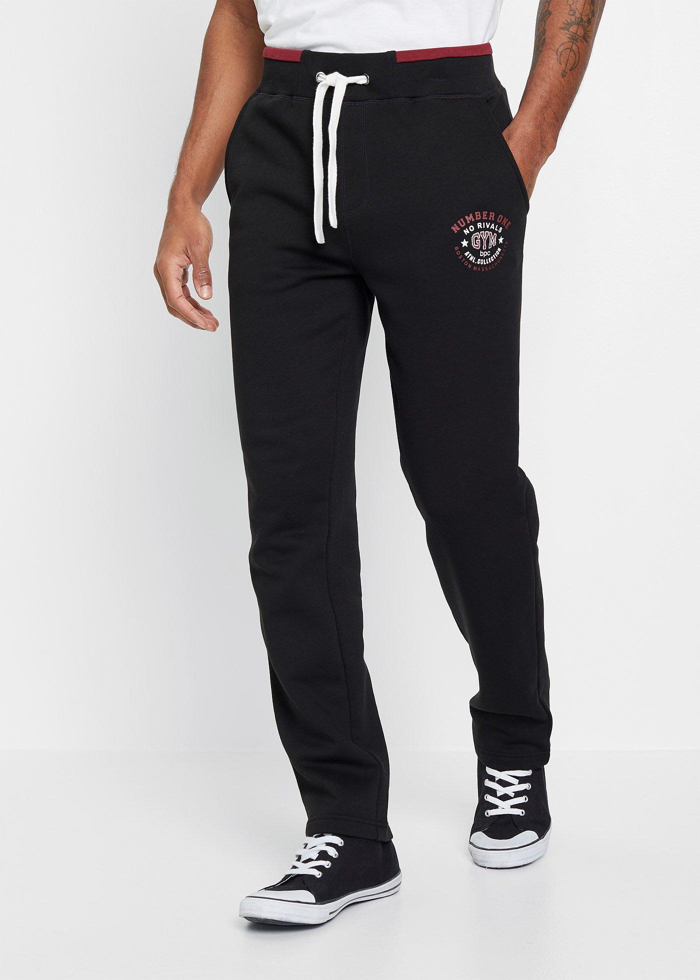 Spodnie sportowe z czystej bawełny, ze sportowymi detalami - Bonprix