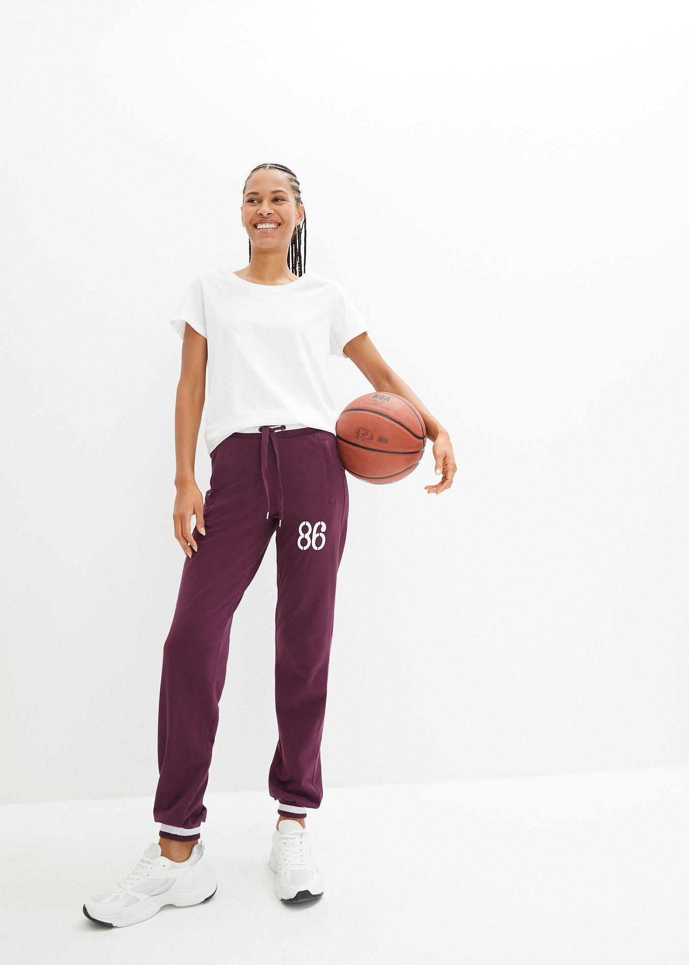 Spodnie dresowe z elastycznego materiału z bawełną - Bonprix