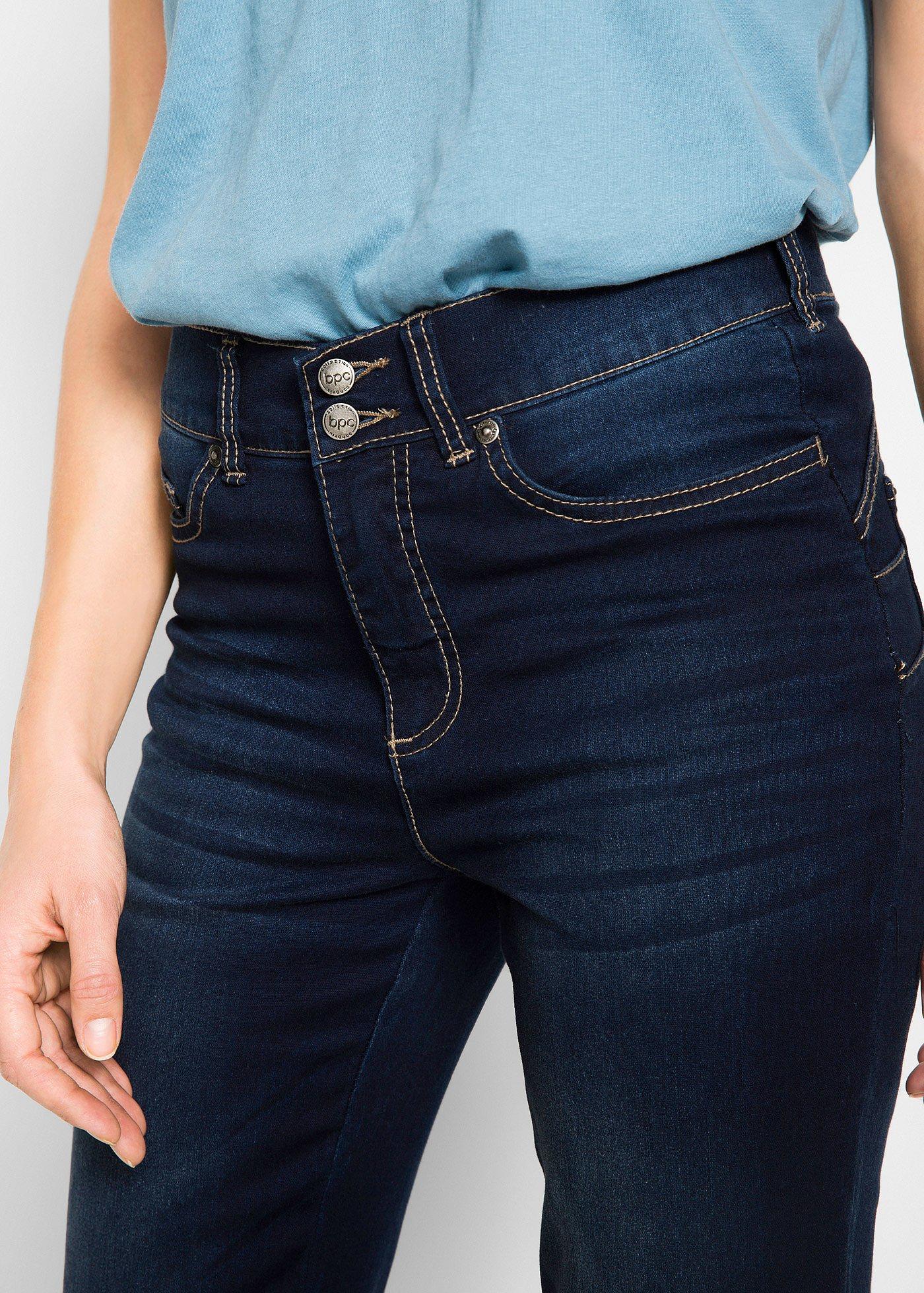 Modelujące dżinsy o kroju bootcut, mid waist - Bonprix