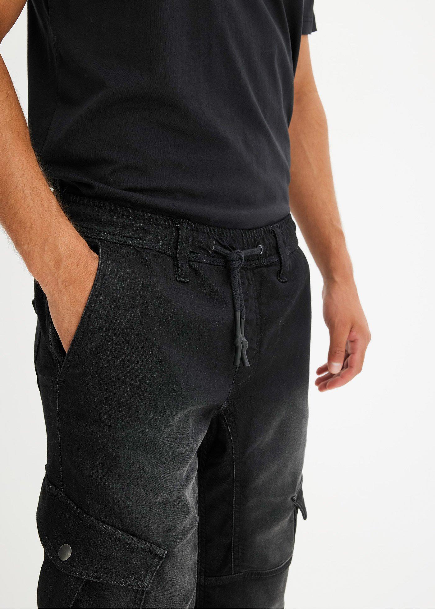 Joggery jeansowe o kroju regular fit z elastyczną gumką w talii, straight - Bonprix