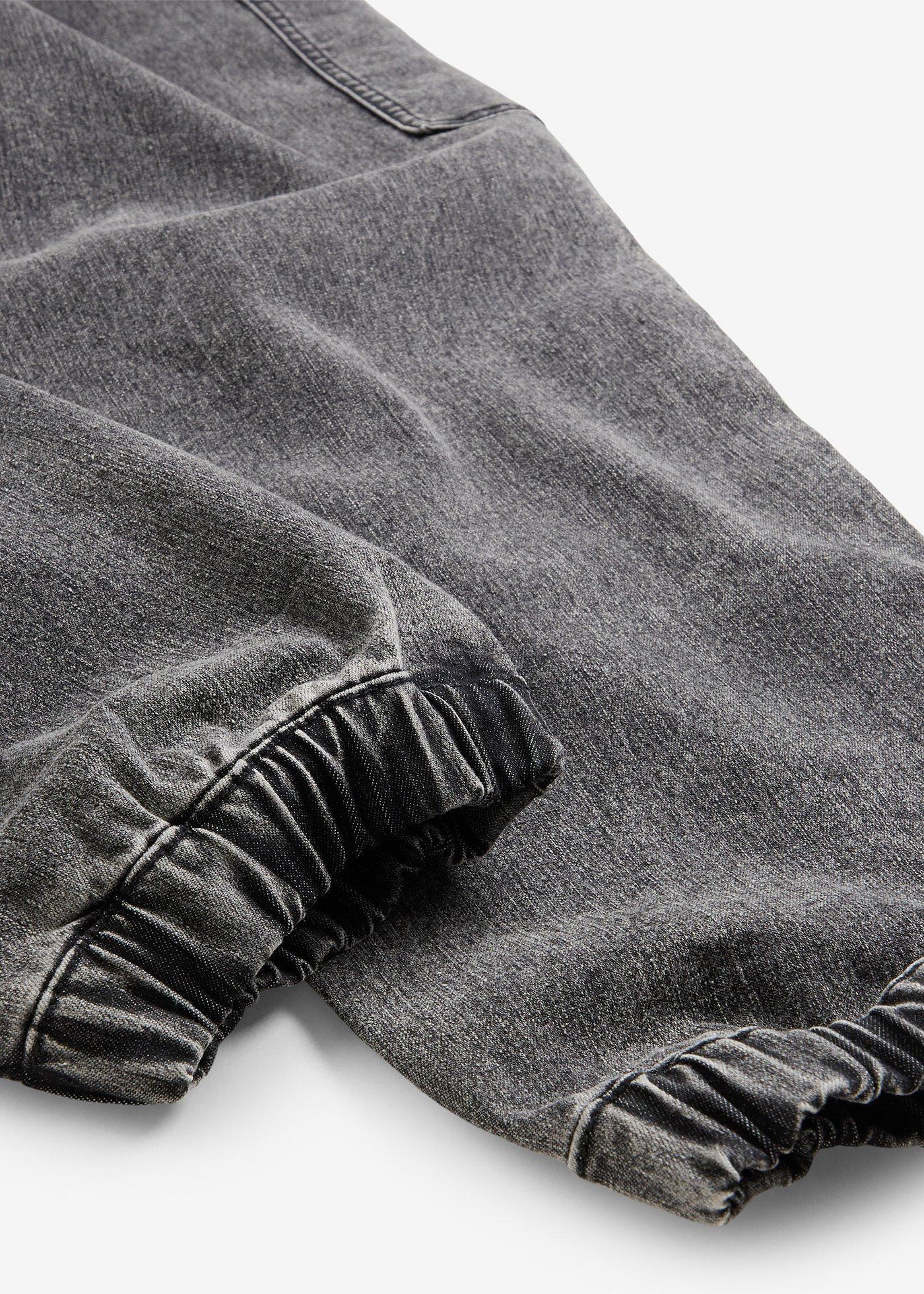 Dżinsy bojówki o kroju loose fit z materiału z domieszką stretchu, z elastyczną gumką w pasie - Bonprix