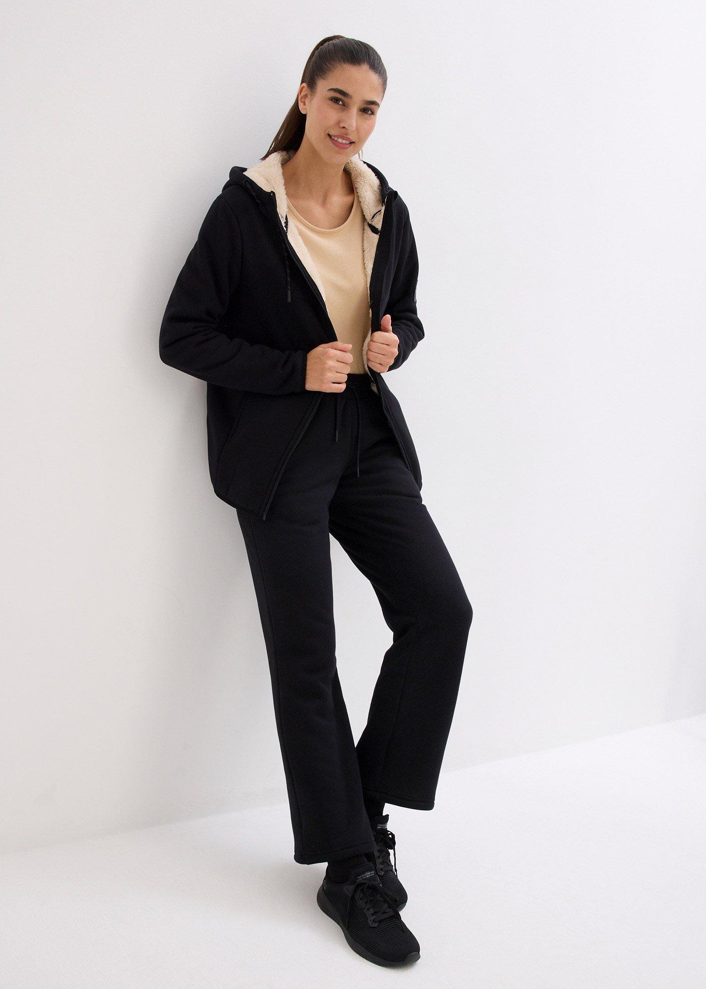 Spodnie sportowe ocieplane, na miękkiej podszewce z polaru, szeroki fason - Bonprix