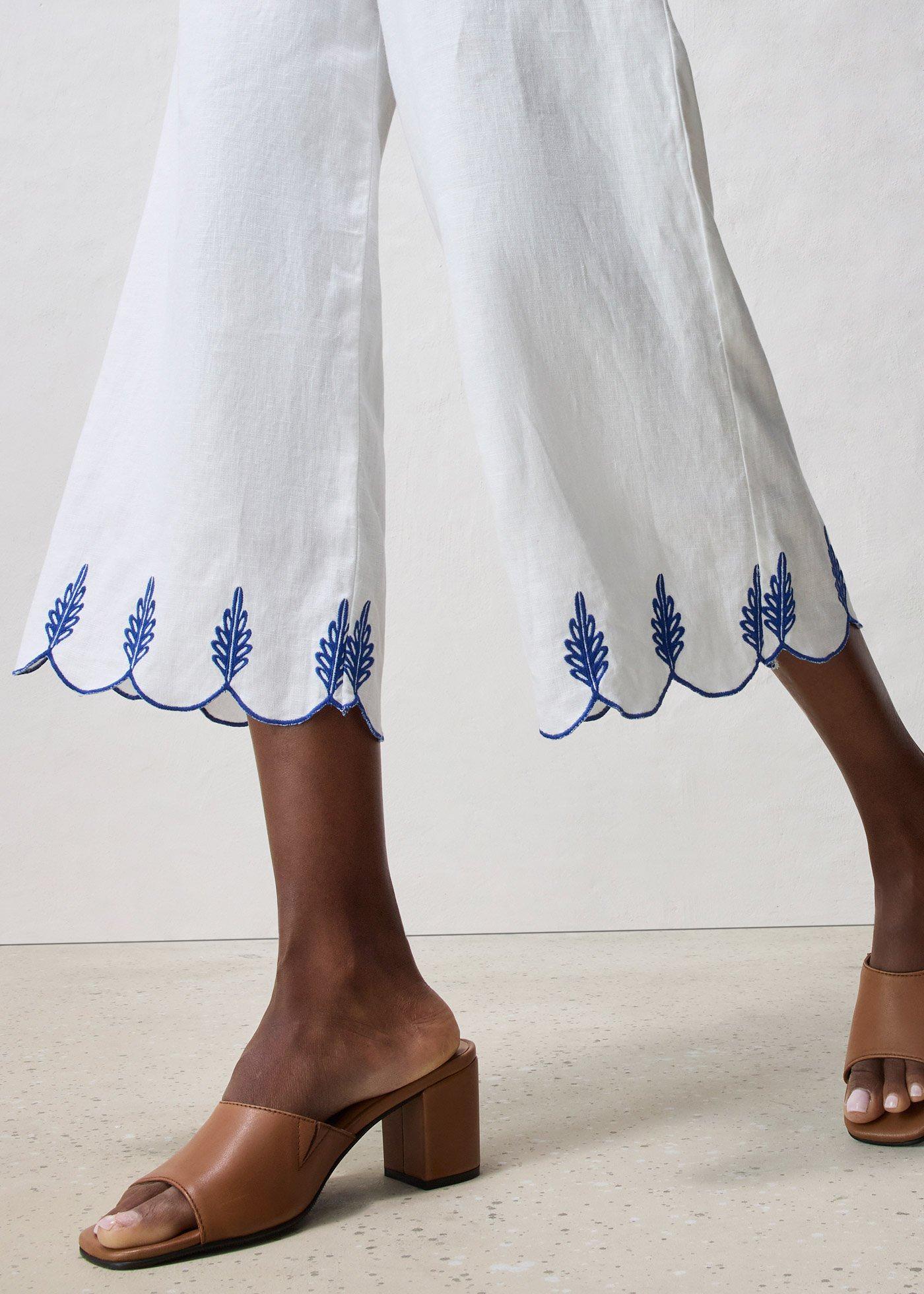 Lniane spodnie culotte z paskiem - Bonprix
