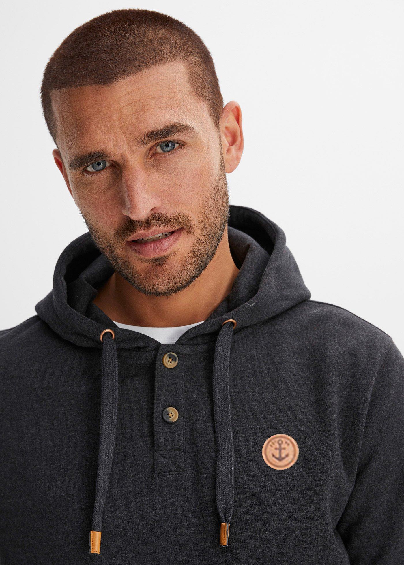 Bluza z kapturem z detalami z imitacji skóry z miękko szorstkowaną stroną wewnętrzną - Bonprix