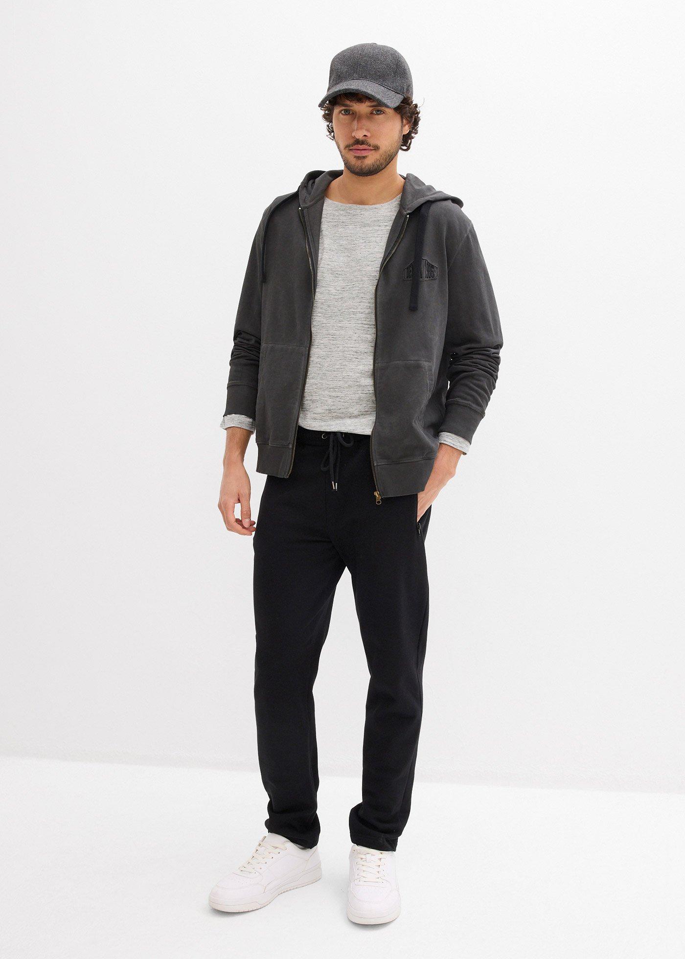 Spodnie sportowe z praktycznymi kieszeniami zapinanymi na zamek - Bonprix