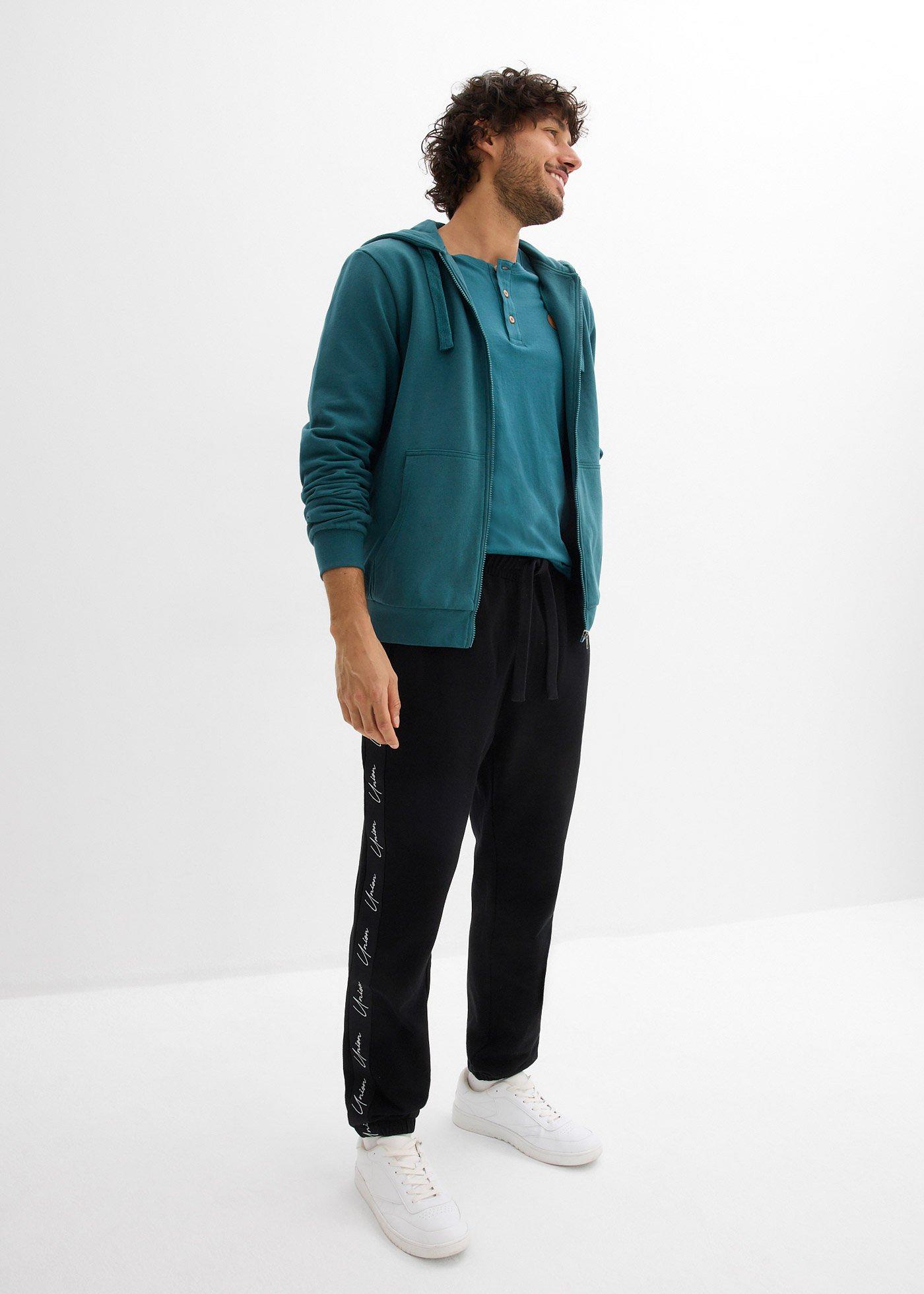 Spodnie joggingowe z czystej bawełny organicznej o kroju loose fit - Bonprix