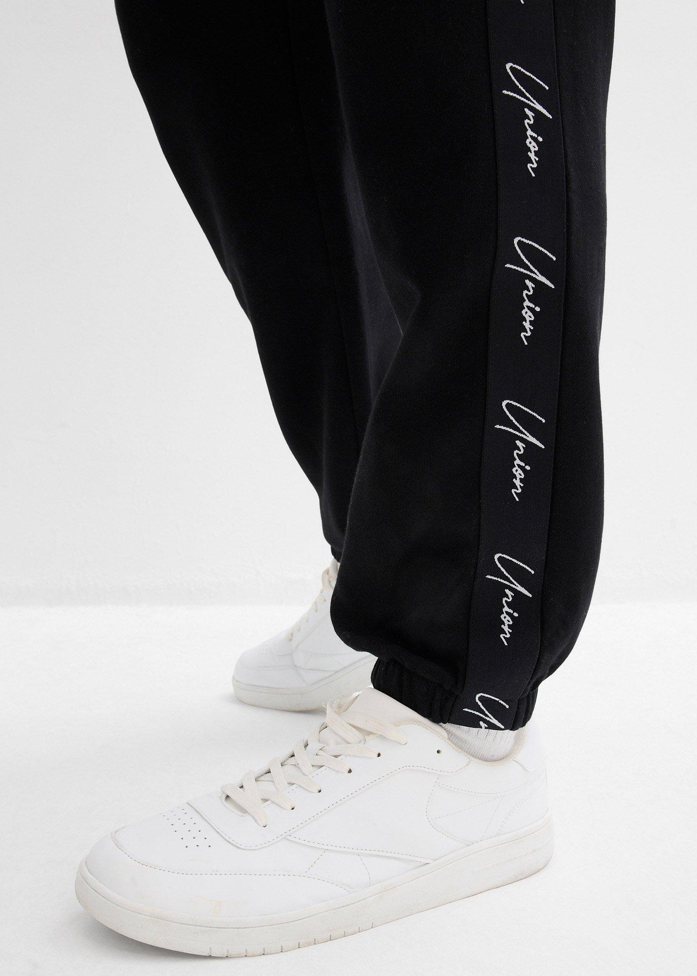 Spodnie joggingowe z czystej bawełny organicznej o kroju loose fit - Bonprix
