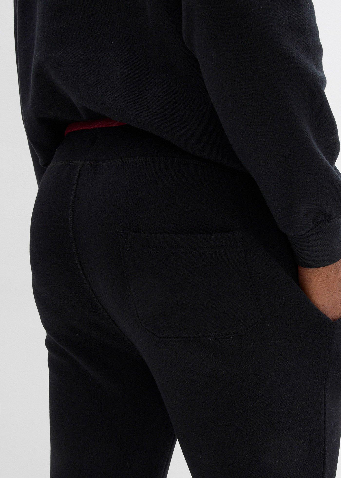 Spodnie sportowe z czystej bawełny, ze sportowymi detalami - Bonprix