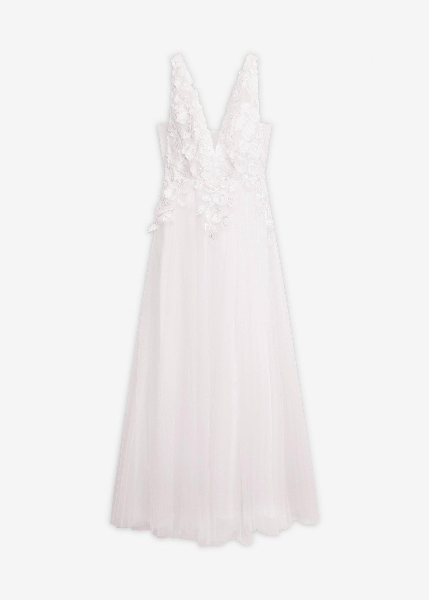 Robe de mariée en tulle avec fleurs appliquées