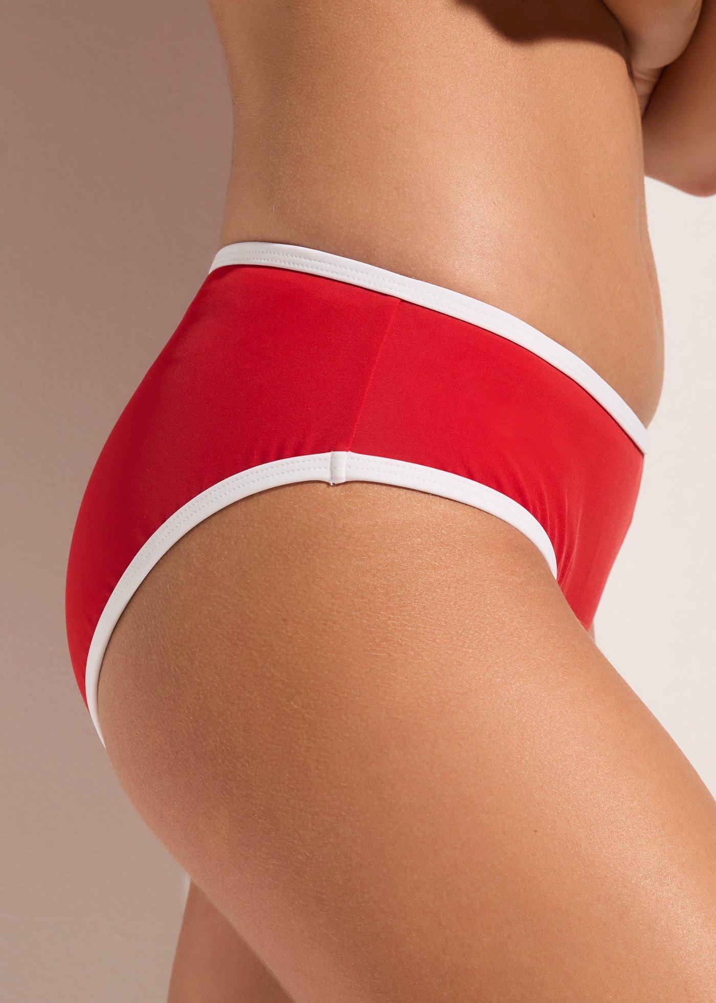 Figi bikini z białym, kontrastowym wykończeniem - Bonprix
