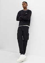 Sweatshirt aus reiner Bio Baumwolle, Loose Fit in schwarz im Look von vorne (Totalaufnahme) - bonprix