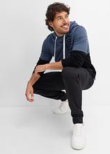 Hoodie aus reiner Bio-Baumwolle in schwarz im Look (Totalaufnahme) - bonprix