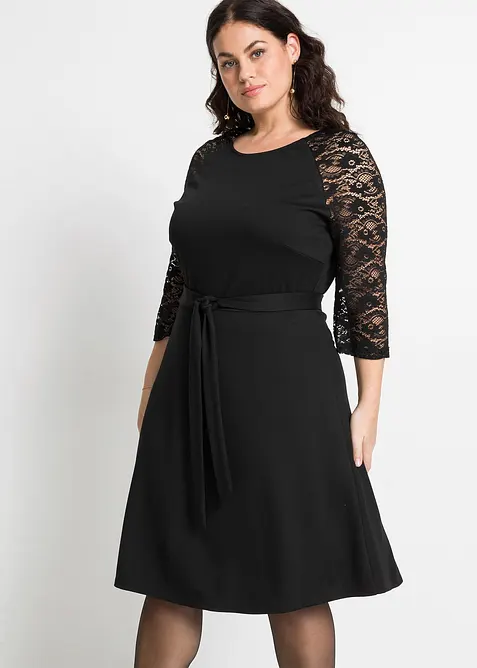 Jerseykleid mit ausgestelltem Rockteil in schwarz von vorne (Totalaufnahme) - bonprix
