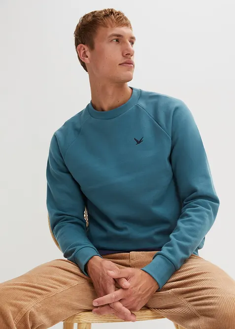Sweatshirt aus weichem Baumwoll-Mix in petrol von vorne (im Anschnitt) - bonprix