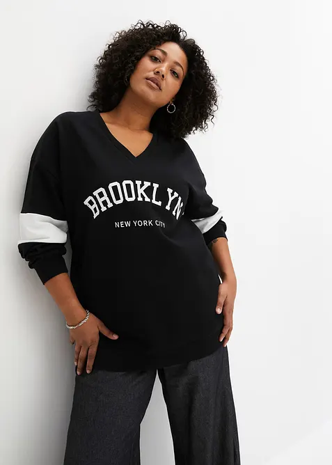 Oversize-Sweatshirt aus Baumwoll-Mix in schwarz von vorne (im Anschnitt) - bonprix