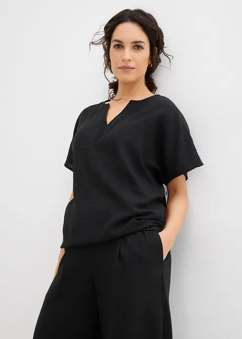 Oversize-Bluse mit Elastiksaum in schwarz von vorne (im Anschnitt) - bonprix