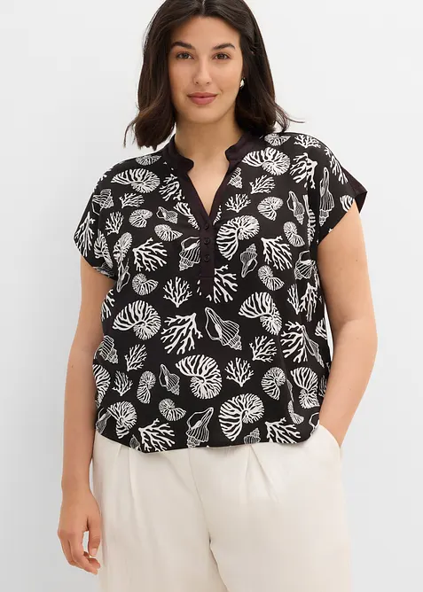 Blusenshirt im Material-Mix in schwarz von vorne (im Anschnitt) - bonprix