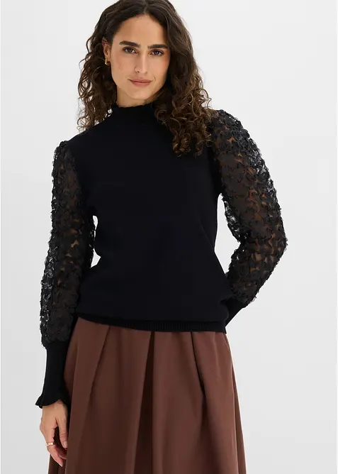 Rollkragenpullover aus weichem Viskose-Mix in schwarz von vorne (im Anschnitt) - bonprix