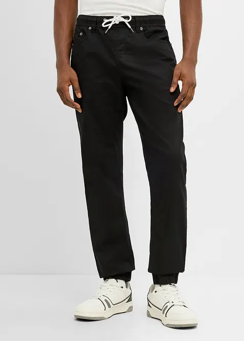 Regular-Fit Stretch-Schlupfhose, Tapered in schwarz von vorne - bonprix