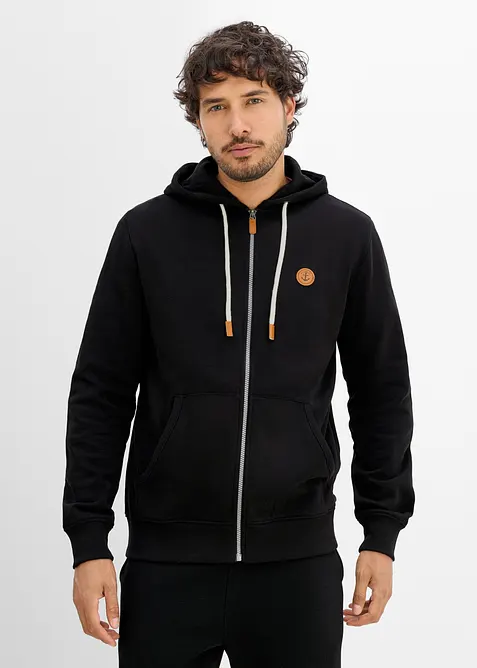 Kapuzen-Sweatjacke aus weichem Baumwoll-Mix in schwarz von vorne (im Anschnitt) - bonprix