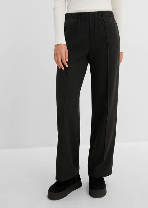 Schlupfhose aus weichem Rippjersey in schwarz von vorne - bonprix