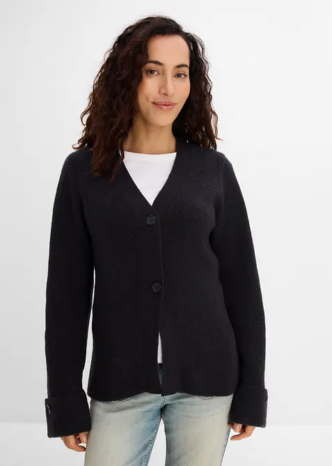 Taillierte Feinstrickjacke in schwarz von vorne (im Anschnitt) - bonprix