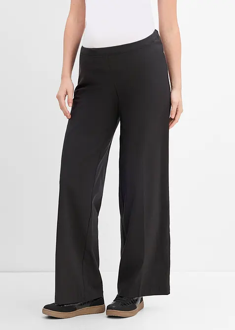 2-in-1 weite Stretch- Umstandshose für die Schwangerschaft und danach in schwarz von vorne - bonprix