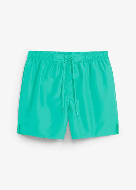 Badeshorts mit seitlichen Taschen in grün von vorne - bonprix