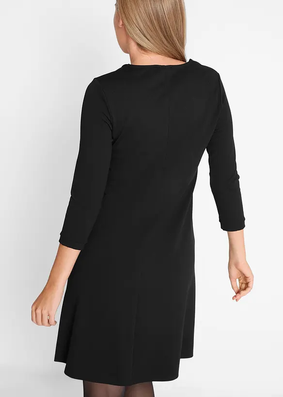Shirtkleid aus Punto di Roma in schwarz von hinten (Totalaufnahme) - bonprix