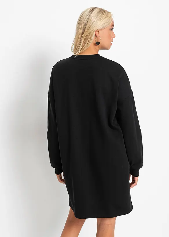 Oversized Sweatkleid in schwarz von hinten (Totalaufnahme) - bonprix