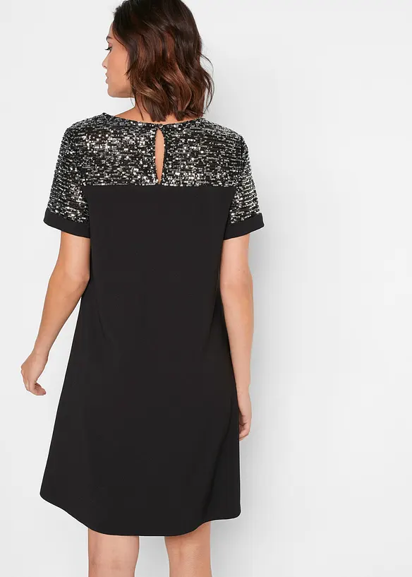 Kleid mit Pailetten-Einsatz in schwarz von hinten (Totalaufnahme) - bonprix