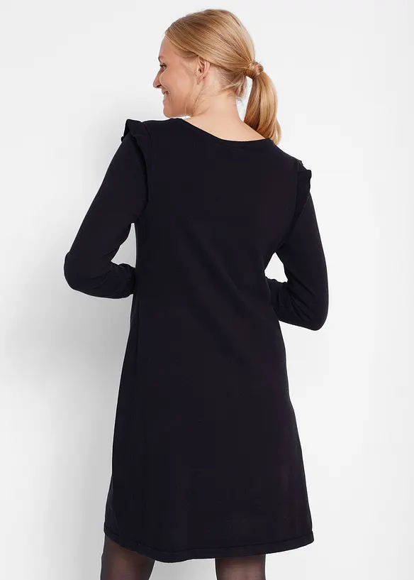 Umstandskleid aus weichem Strick in schwarz von hinten (Totalaufnahme) - bonprix