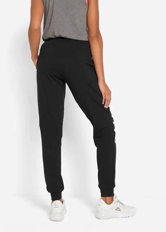 Jogginghose aus Baumwolle mit Druck, Loose Fit in schwarz von hinten - bonprix
