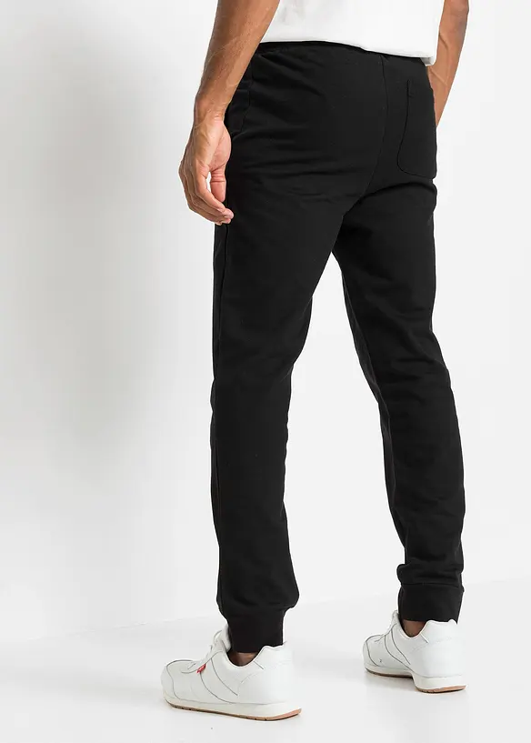 Jogginghose aus reiner Baumwolle in schwarz von hinten - bonprix