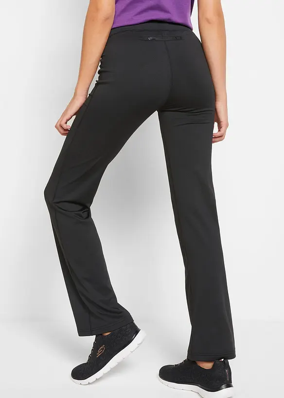 Ausgestellte Thermo Sport-Leggings, schnelltrocknend in schwarz von hinten - bonprix