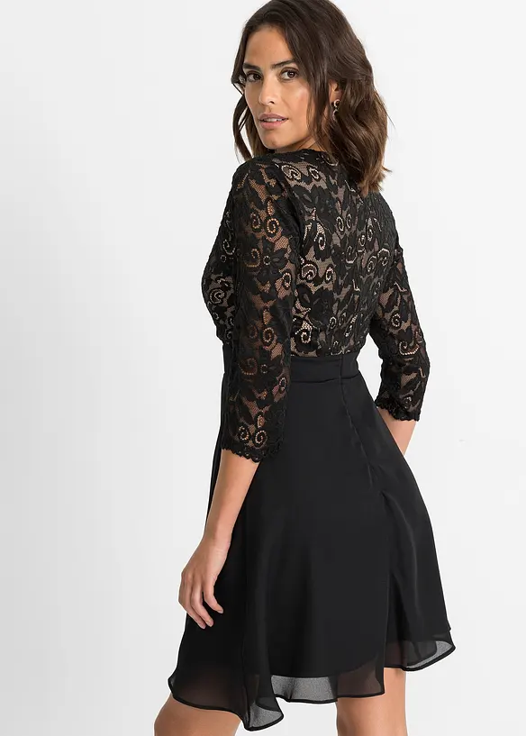 Chiffonkleid mit Spitze in schwarz von hinten (Totalaufnahme) - bonprix