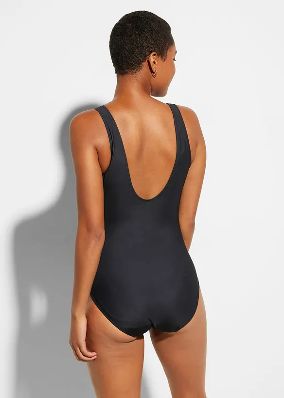 Medium Shape-Badeanzug mit Einsätzen in schwarz von hinten (Totalaufnahme) - bonprix