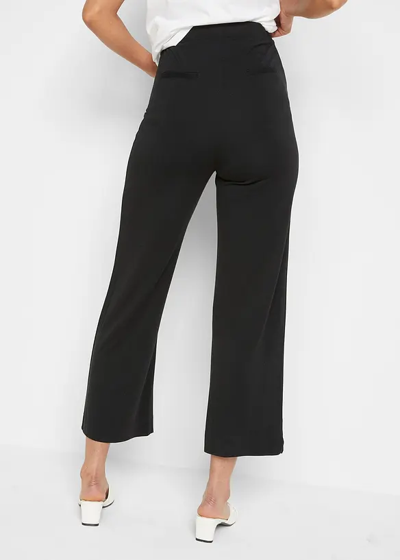 Knöchelfreie Umstands-Culotte aus elastischen Punto-di Roma in schwarz von hinten - bonprix