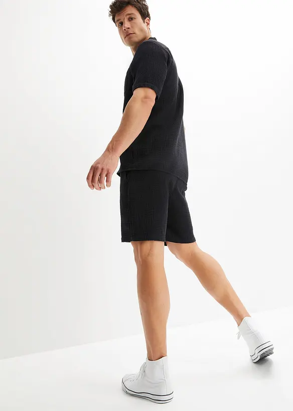 Kurzarmhemd aus Musselin in Regular Fit in schwarz von hinten (im Anschnitt) - bonprix