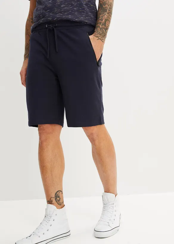 Sweat-Bermuda mit Reißverschlusstaschen in blau von vorne - bonprix
