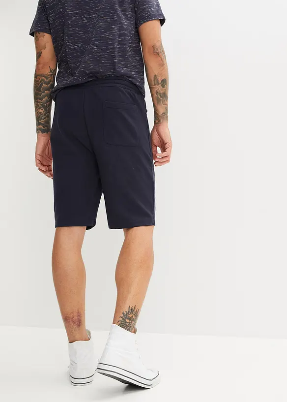 Sweat-Bermuda mit Reißverschlusstaschen in blau von hinten - bonprix