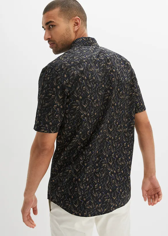 Kurzarmhemd aus Baumwoll-Popeline in Regular Fit in schwarz von hinten (im Anschnitt) - bonprix