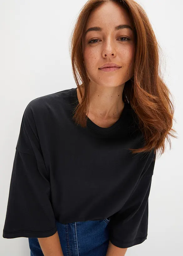 Oversize-Shirt aus elastischem Bio-Baumwoll-Mix in schwarz von vorne (im Anschnitt) - bonprix