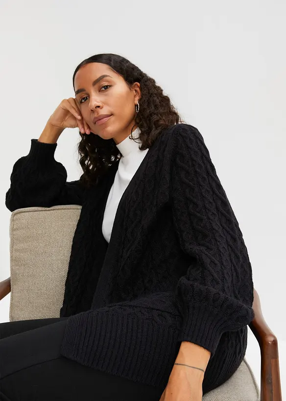 Longstrickjacke mit Ballonärmeln in schwarz von vorne (im Anschnitt) - bonprix