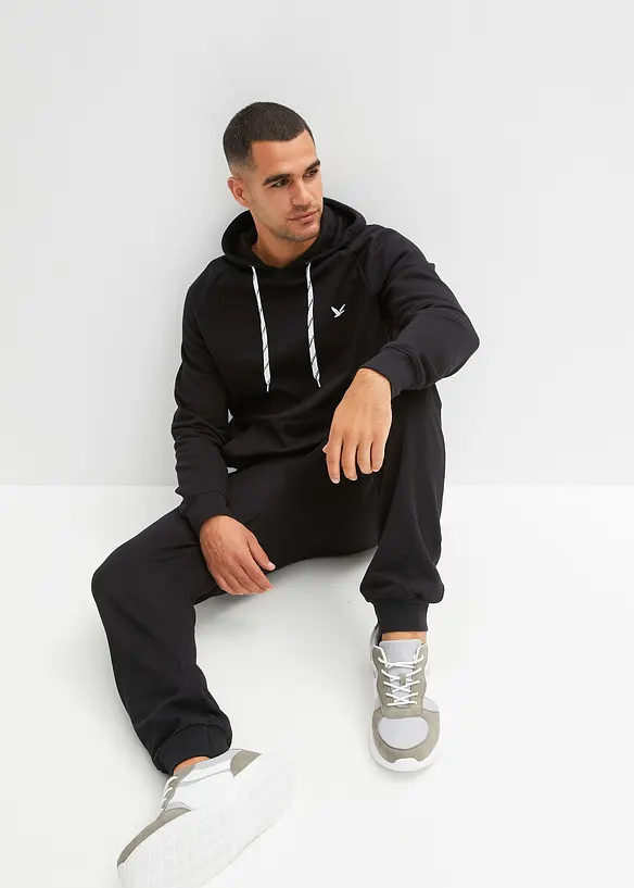 Jogginganzug (2-tlg. Set) aus reiner Baumwolle in schwarz von vorne (Totalaufnahme) - bonprix