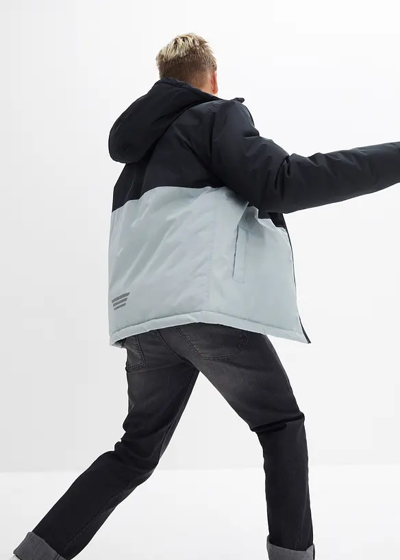 wasserdichte Winterjacke im Colourblocking mit Kapuze in schwarz von hinten (im Anschnitt) - bonprix