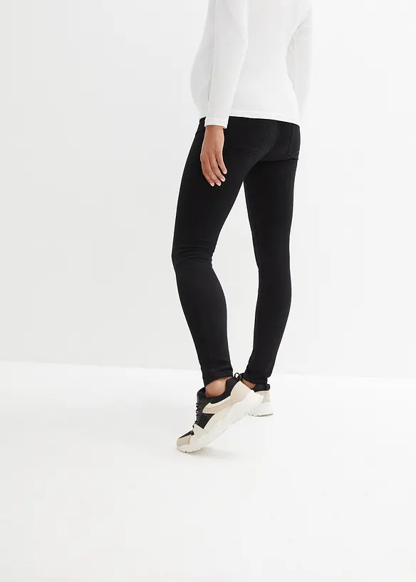 Wärmende Umstandsjeggings mit leicht angerauter Innenseite in schwarz von hinten - bonprix