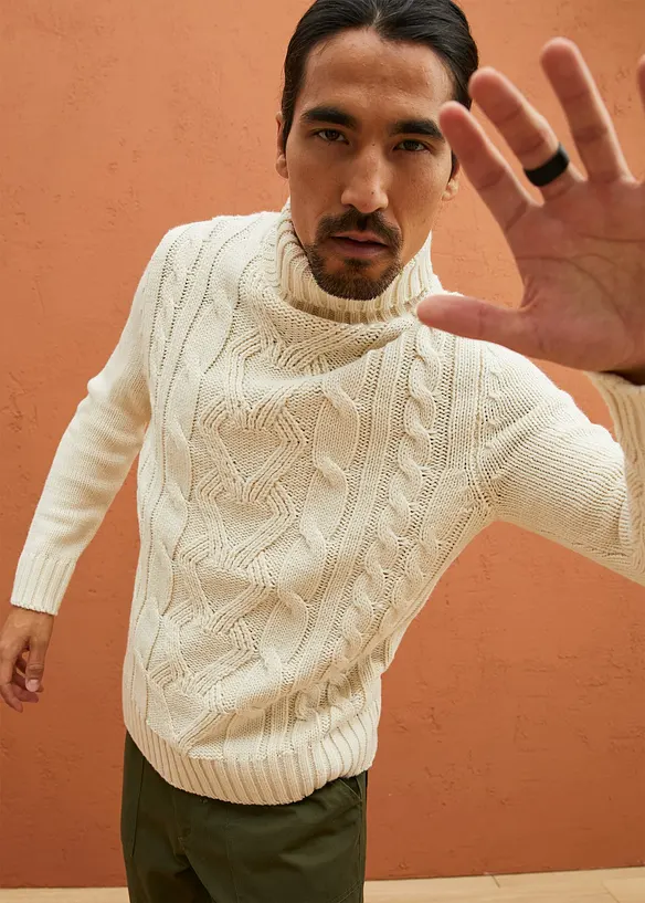 Rollkragenpullover mit Zopfmuster in beige von vorne (im Anschnitt) - bonprix
